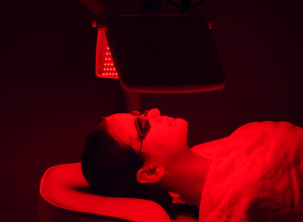 Woman in Red Light Therapy Houston Texas